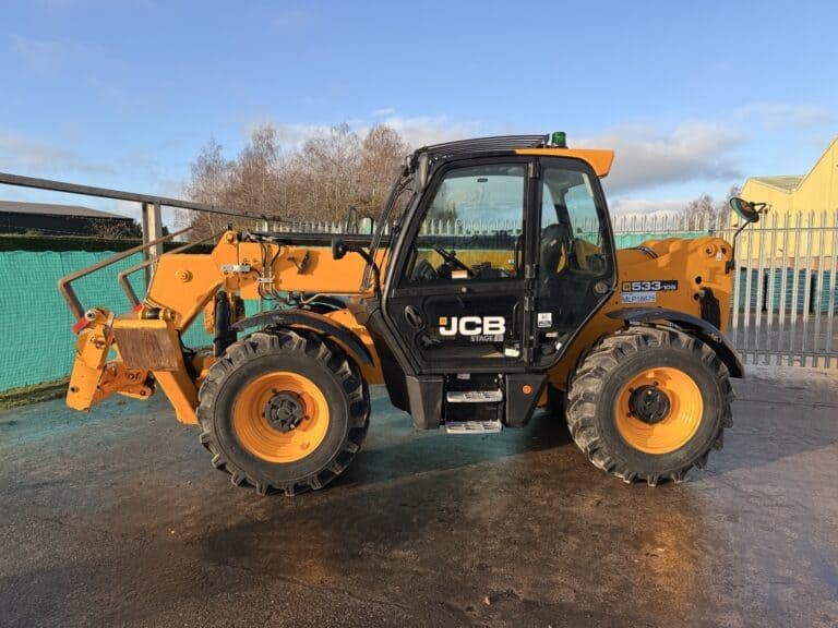 Yellow JCB telescopic handler on construction site