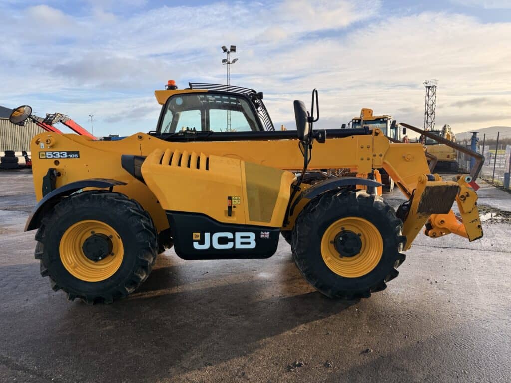 Yellow JCB telehandler at construction site