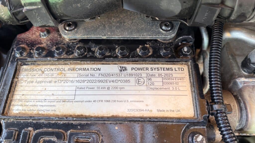 JCB engine emission control information plate close-up